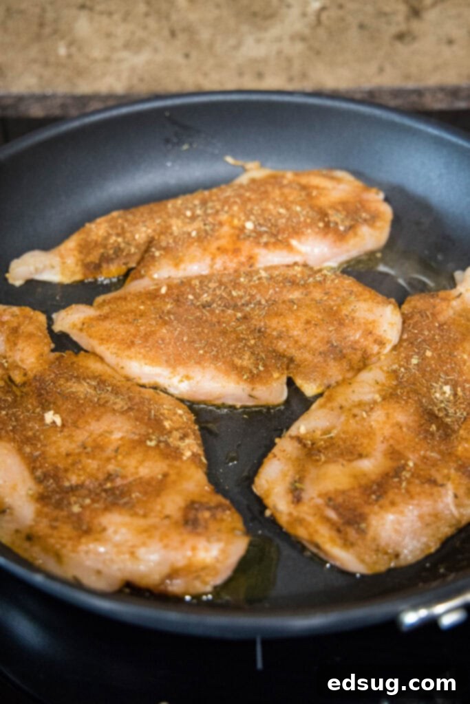 cooking chicken in a skillet