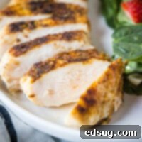 cropped close up sliced blackened chicken