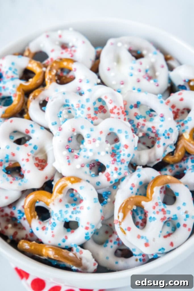 Stars and Stripes Twists 2 A bowl filled with festive red, white, and blue patriotic pretzels, ready for a celebration.