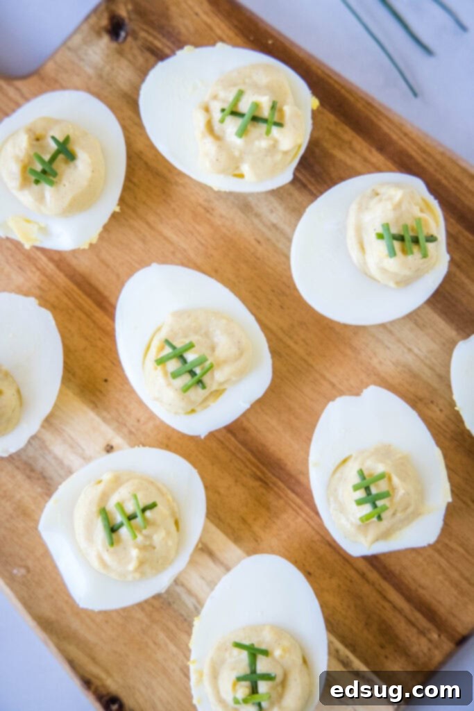 Touchdown Deviled Eggs 6 a cutting board with football deviled eggs