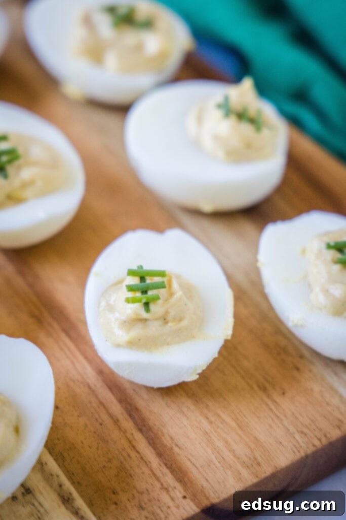 Touchdown Deviled Eggs 7 football deviled eggs on a cutting board