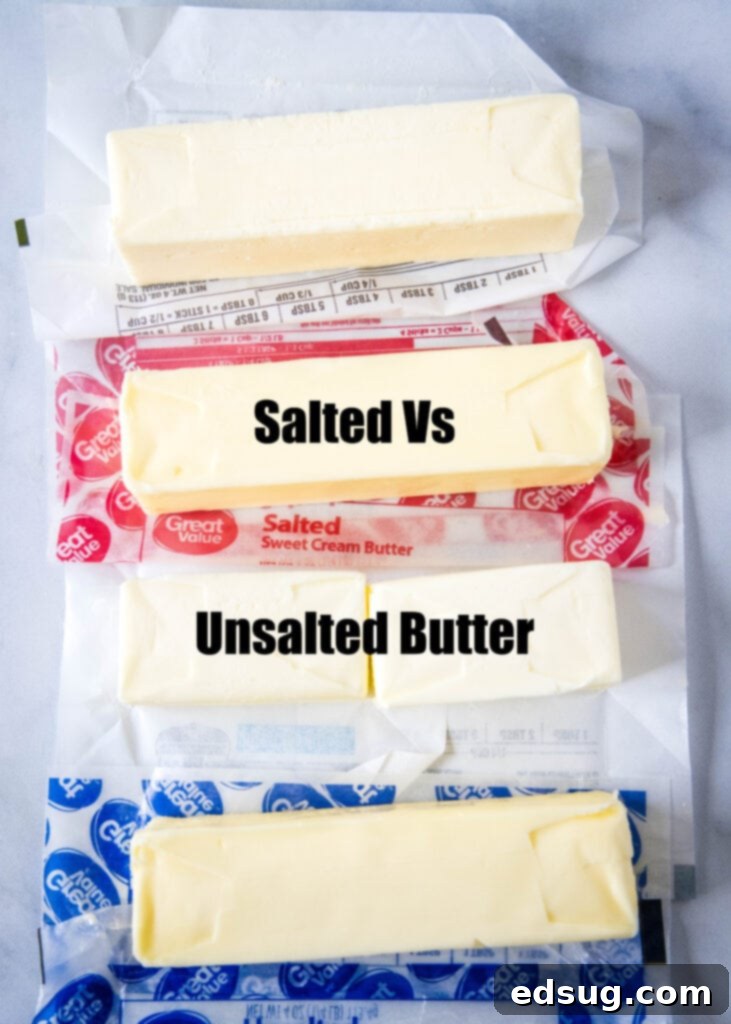 The Butter Dilemma Salted Or Unsalted 2 salted vs unsalted butter blocks on a cutting board with a knife