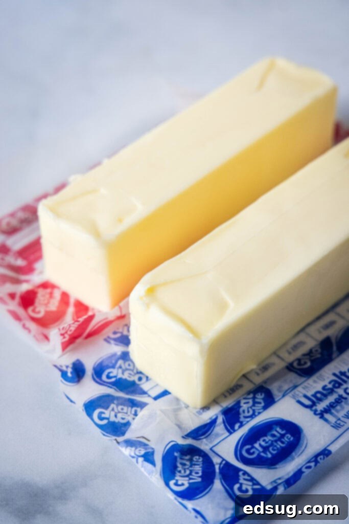 The Butter Dilemma Salted Or Unsalted 6 sticks of butter on a wrapper ready to be used