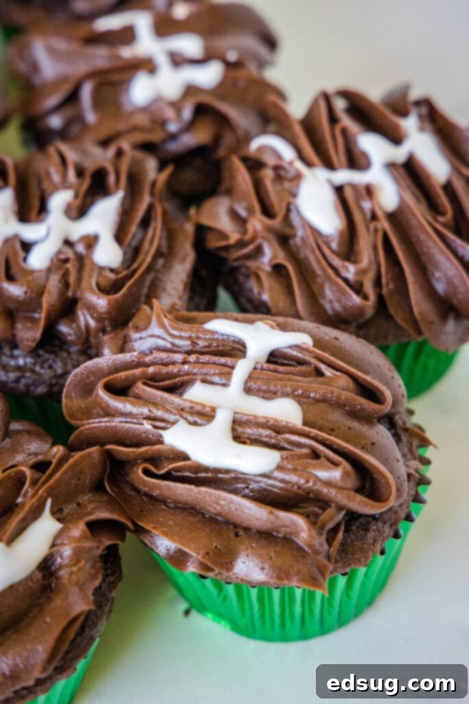 chocolate cupcakes decorated like footballs