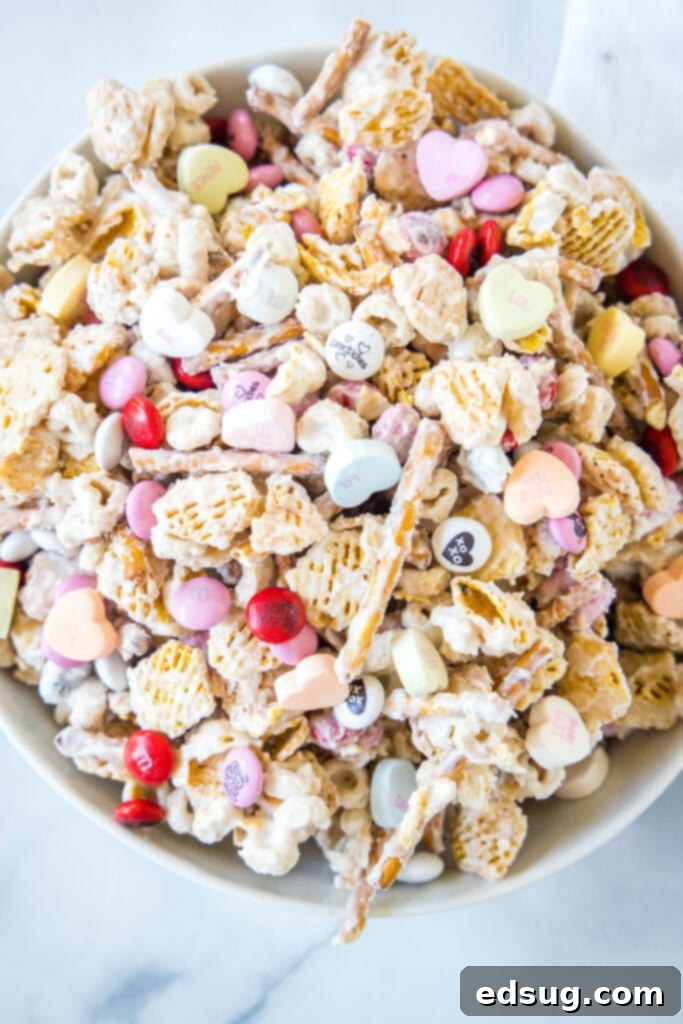 looking down on a bowl of valentine's day snack mix