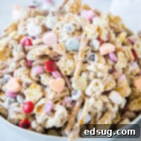 cropped close up of a bowl of valentines day chex mix