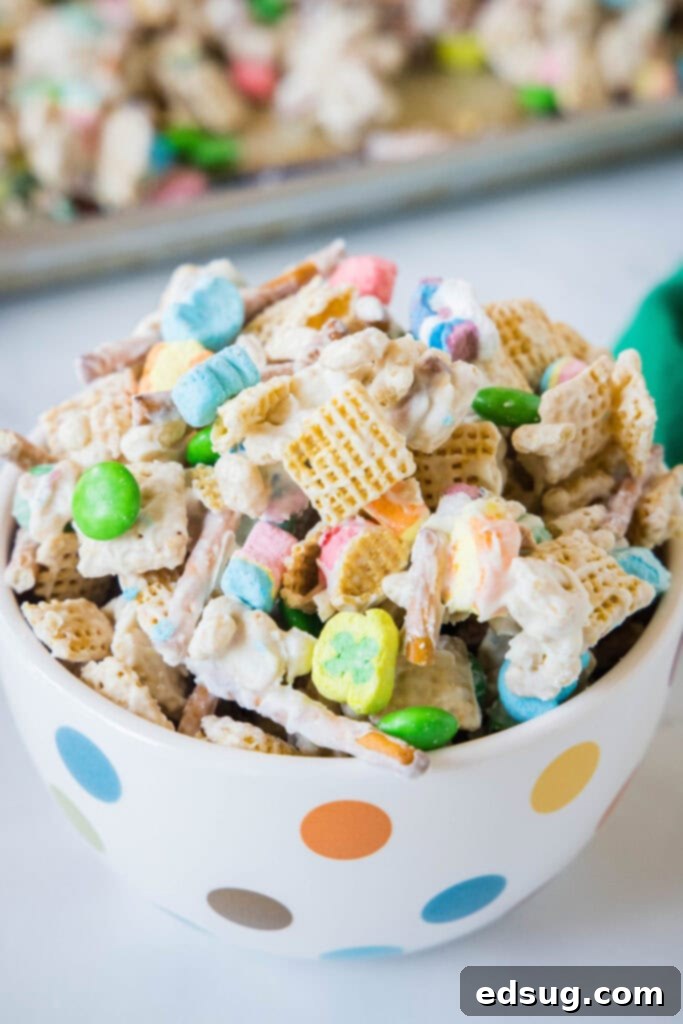 a bowl filled with finished leprechaun bait snack mix, ready to eat