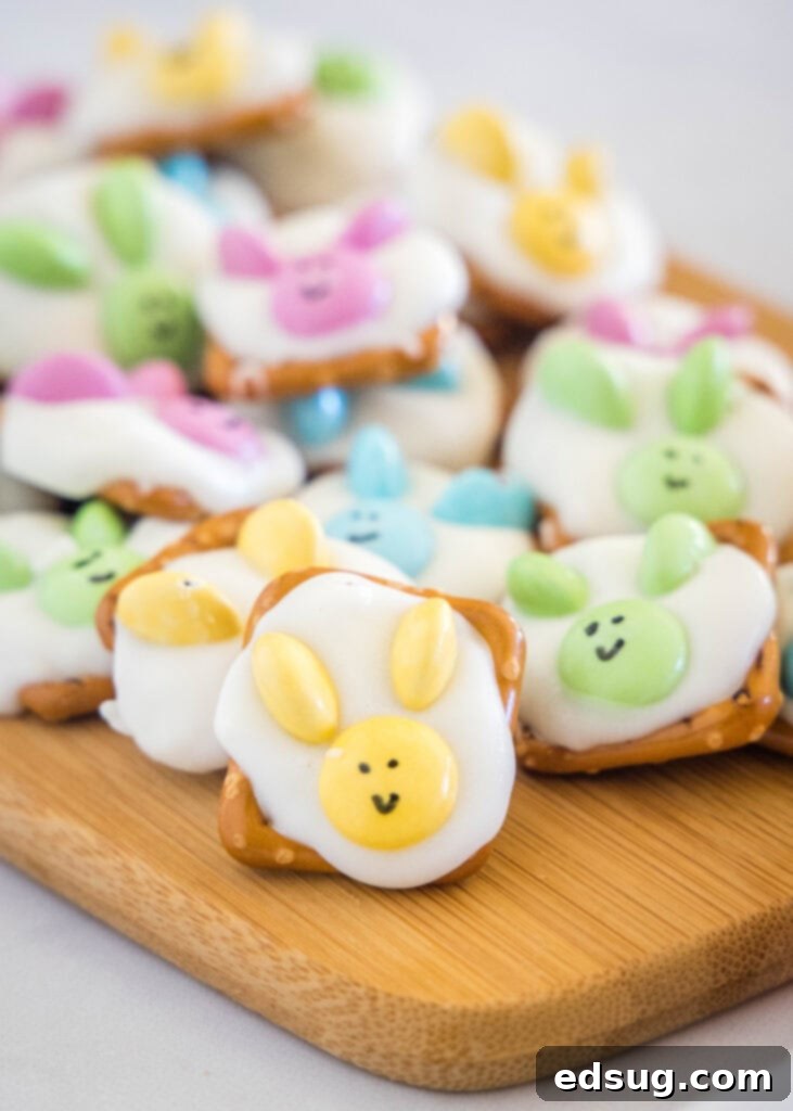 Cute bunny pretzels arranged on a wooden cutting board, ready for Easter