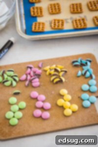 M&M's cut in half on a cutting board