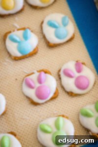 the bunny ears added to the white chocolate on a the pretzels