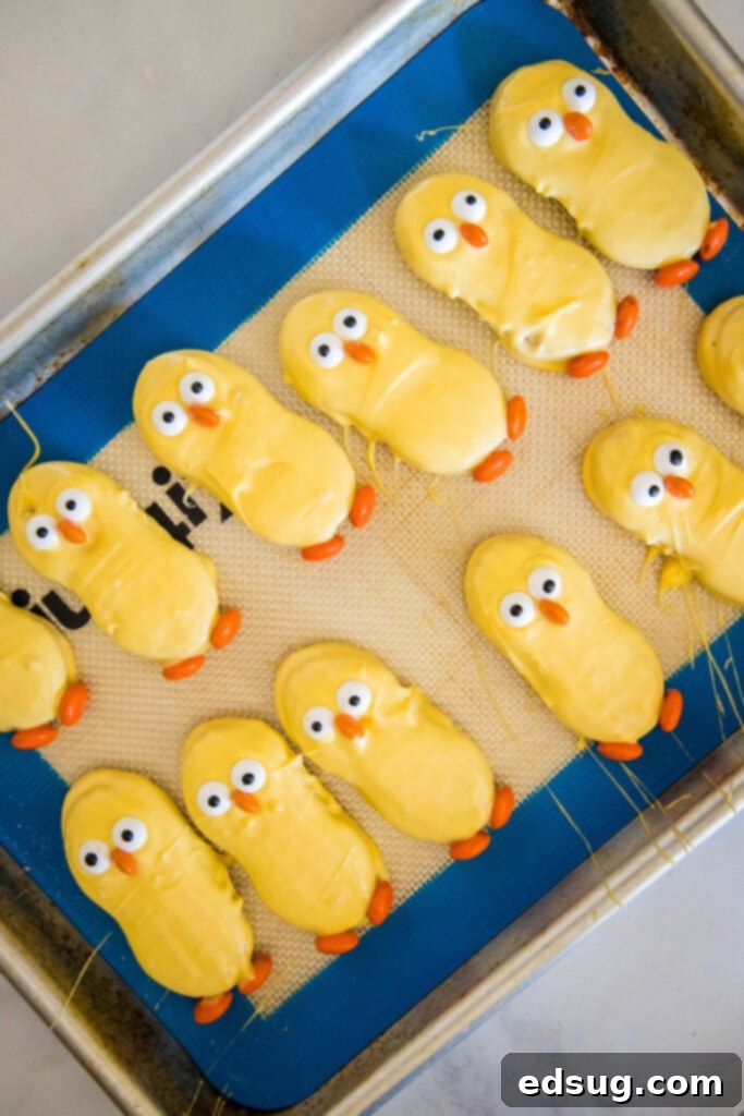 Peanut Butter Chick Delights 5 nutter butter chicks setting up on a baking sheet