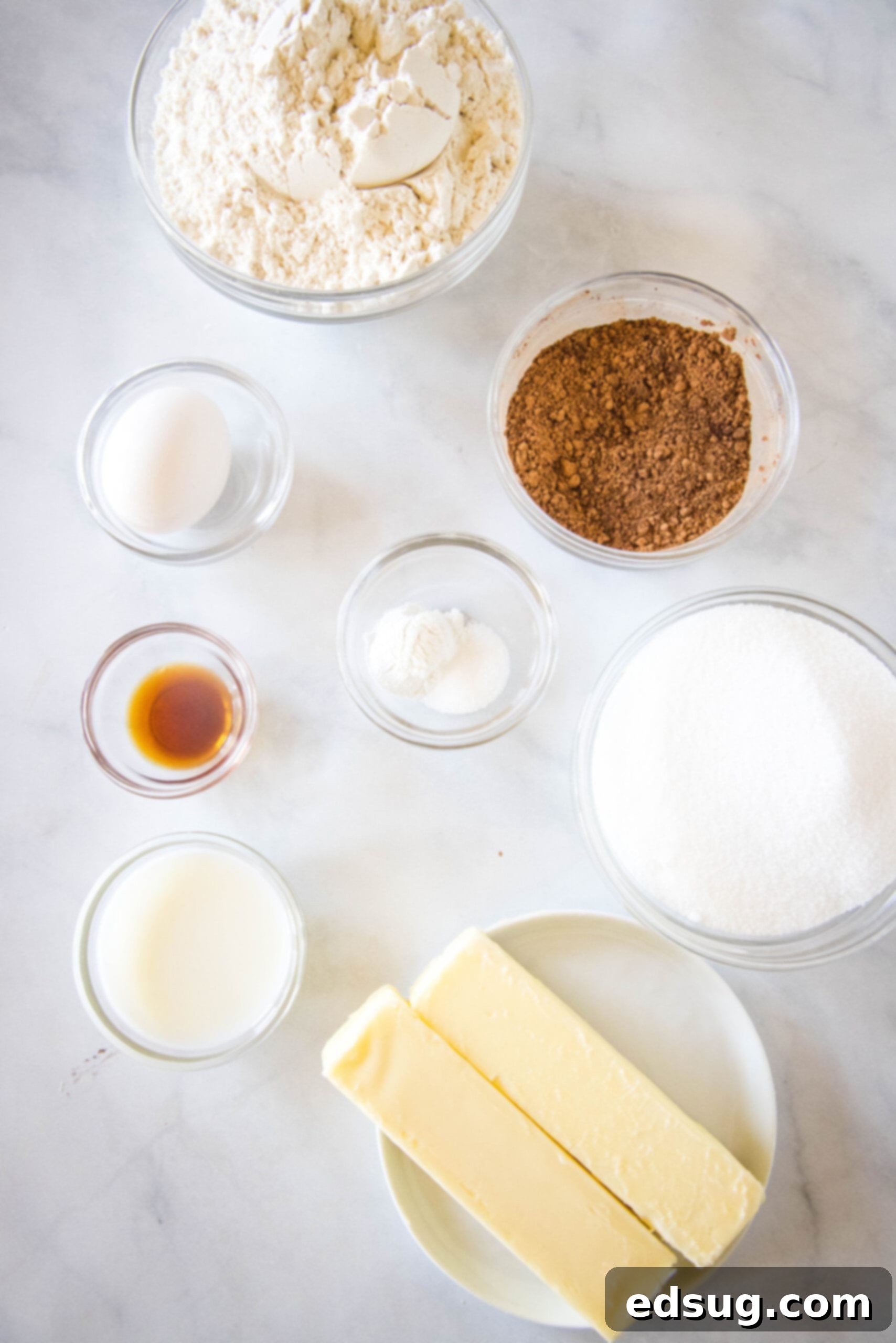 Ingredients for the chocolate sugar cookies used to make football cookies, neatly laid out.