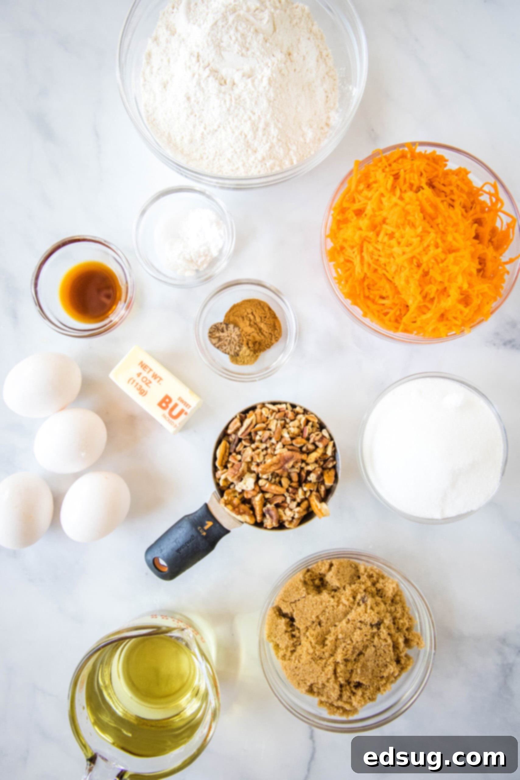 The best homemade carrot cake! Made from moist cake layers loaded with crunchy pecans, filled and frosted with sweet cream cheese frosting. Ingredients for homemade carrot cake.