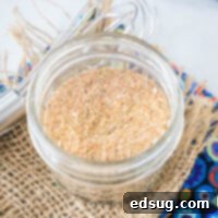 cropped close up chicken seasoning in a mason jar
