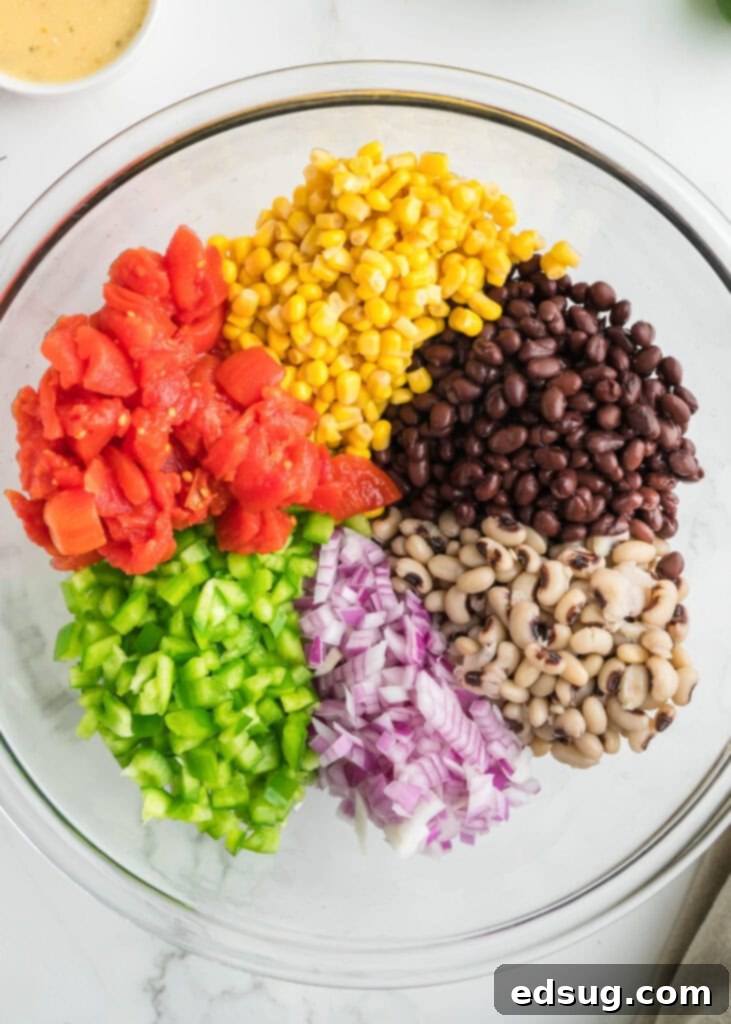 Texas Caviar 3 A mixing bowl filled with the fresh ingredients for Texas Caviar before being combined with the dressing.