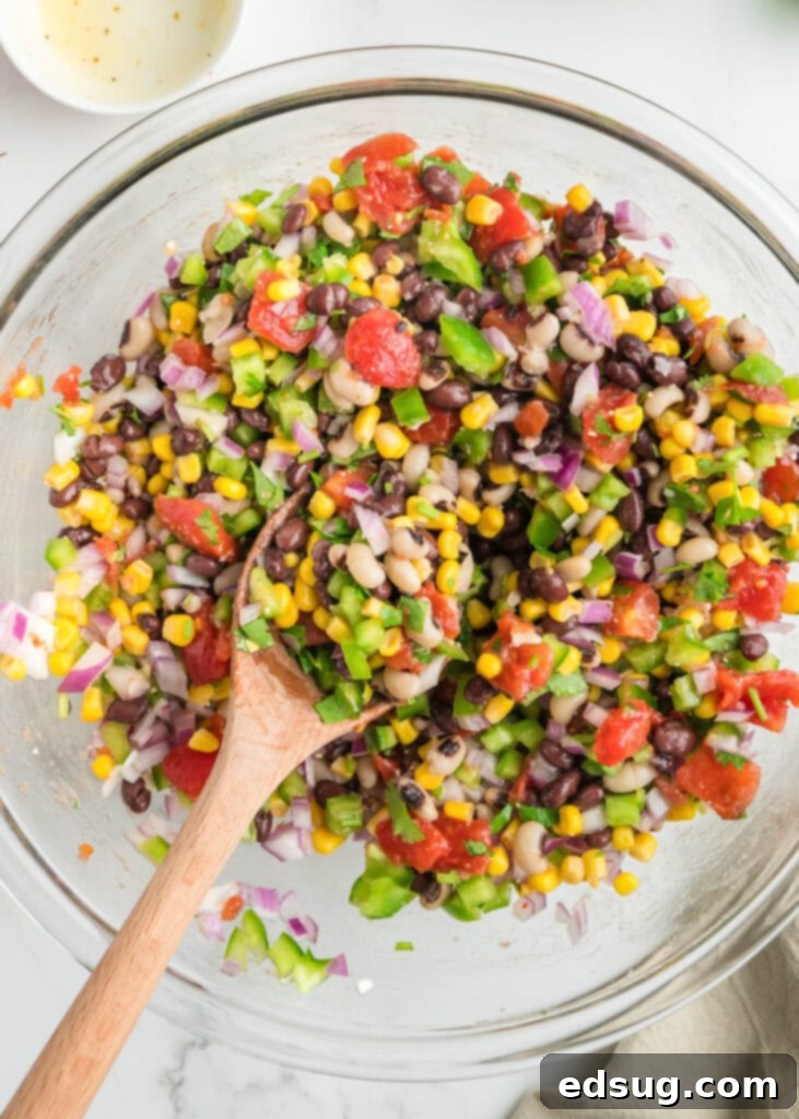 Texas Caviar 4 A large mixing bowl showcasing the freshly prepared Cowboy Caviar, ready to be served.