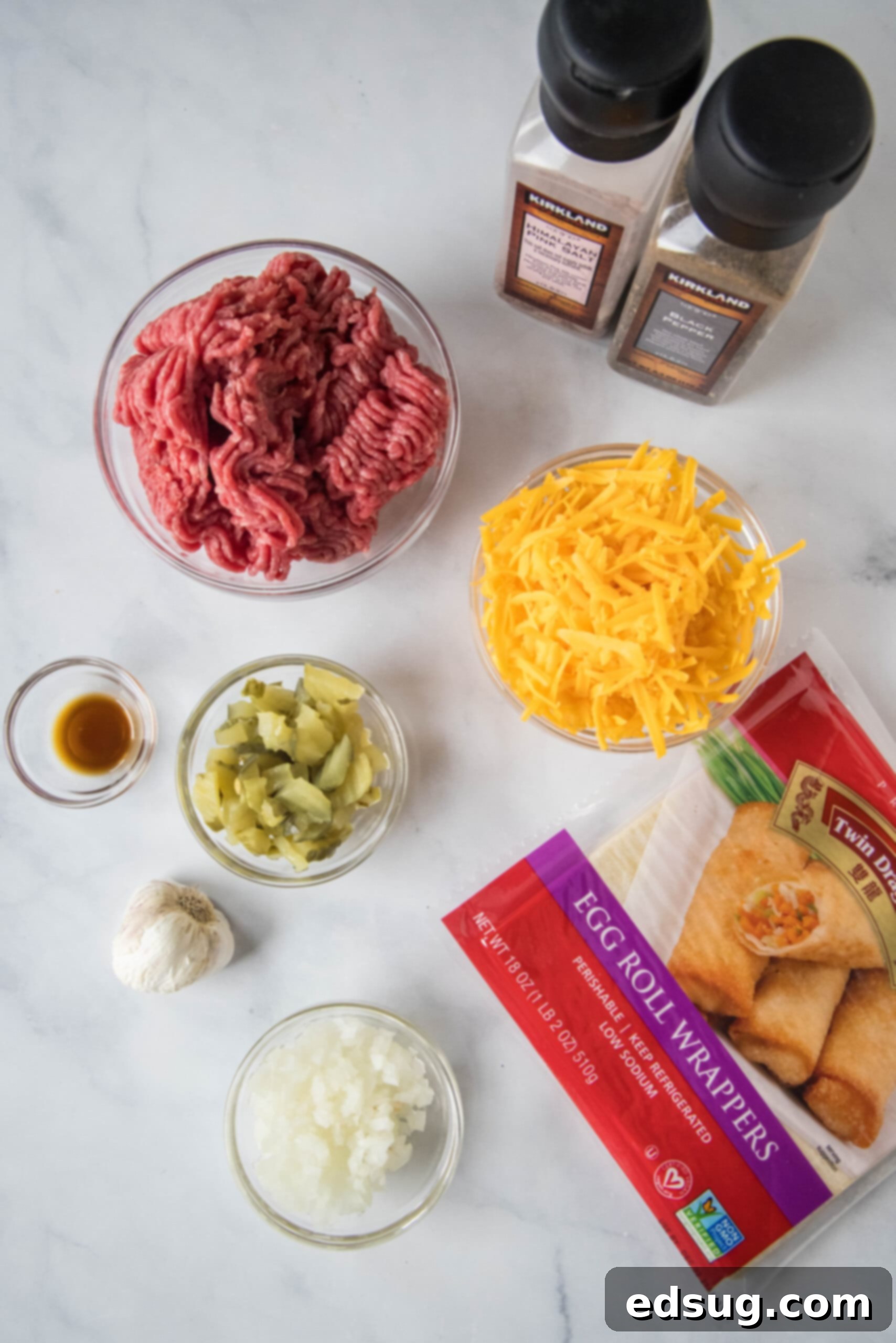 Looking for a fun and easy appetizer recipe? Try these cheeseburger egg rolls complete with creamy, tangy homemade burger sauce for dipping! Ingredients for cheeseburger egg rolls.