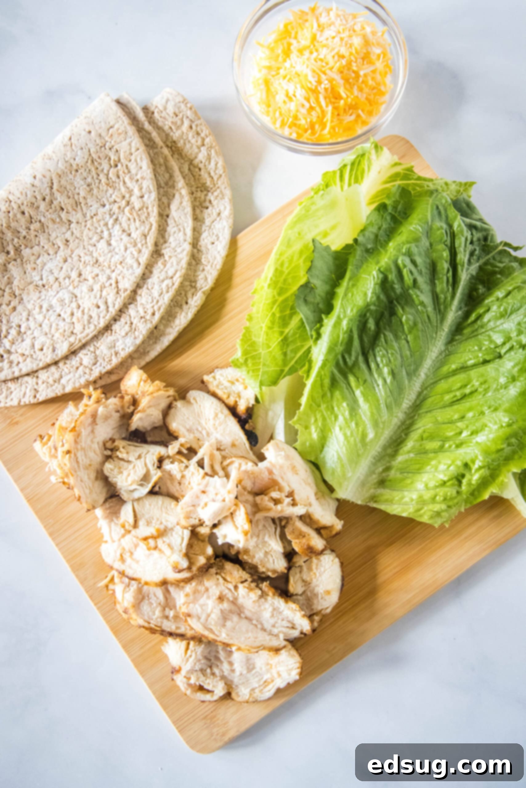 This easy Chick Fil A Cool Wrap recipe is the best excuse to skip the drive-thru! Enjoy this copycat at home with your favorite dipping sauce. Ingredients for a Chick Fil A Cool Wrap.