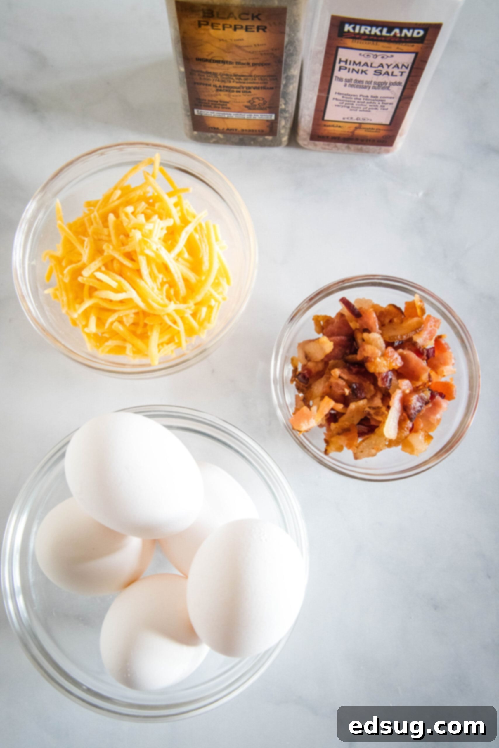 These bacon cheese egg muffins are packed with smoky crumbled bacon and melty cheddar. Enjoy these for brunch, or an easy on-the-go breakfast! Ingredients needed for bacon cheese egg muffins.