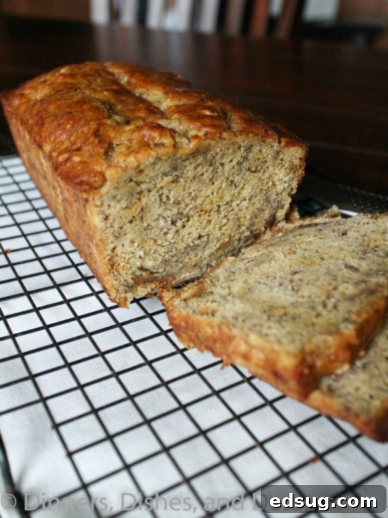 Hearty Whole Grain Banana Loaf 3 Close-up of a rustic loaf of homemade Whole Grain Banana Bread, showcasing its texture