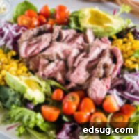Steak salad served on a large platter.