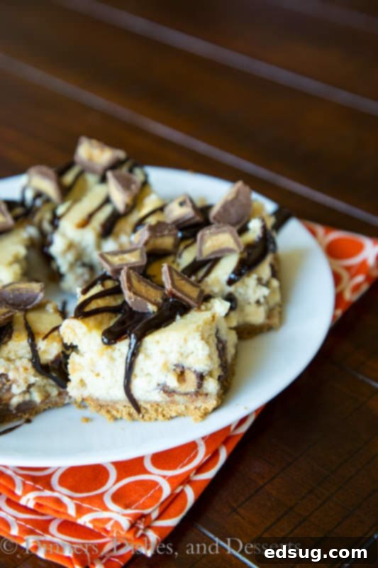 Guilt-Free Peanut Butter Cup Cheesecake 3 skinny peanut butter cup cheesecake on a plate