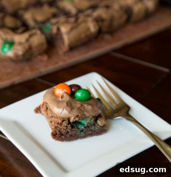 pumpkin spiced m&m brownies on a plate