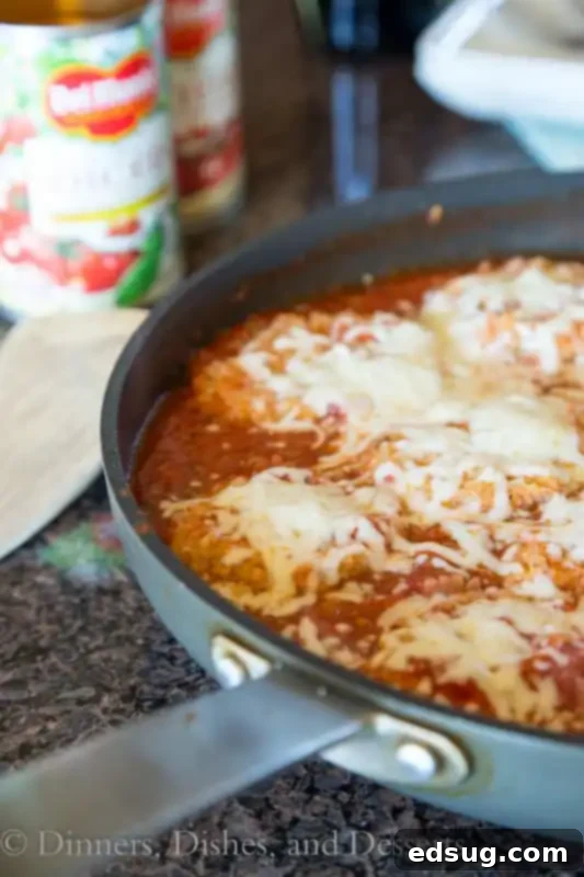 Pork Tenderloin Bruschetta served in a skillet, ready to be enjoyed