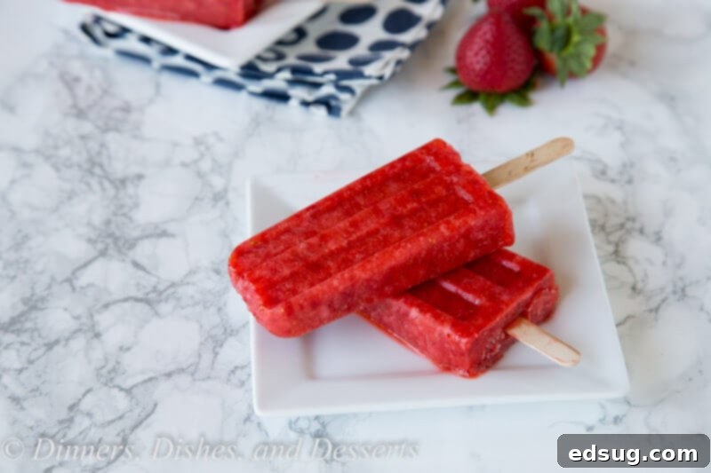 strawberry popsicles on a plate