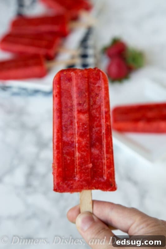 strawberry popsicles on a plate