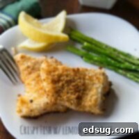 Zesty Lemon-Dill Crispy Fish 1 crispy fish with lemon dill sauce on a plate