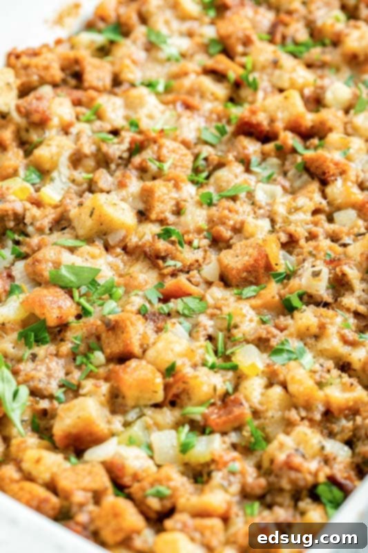 Savory Sausage Mix 2 Thanskgiving sausage stuffing in a casserole dish, ready to be served.