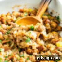 Savory Sausage Mix 8 Sausage Stuffing - the BEST Thanksgiving dressing recipe with savory sausage and herb bread cubes. So easy to make and it is the perfect side dish for your holiday table.
