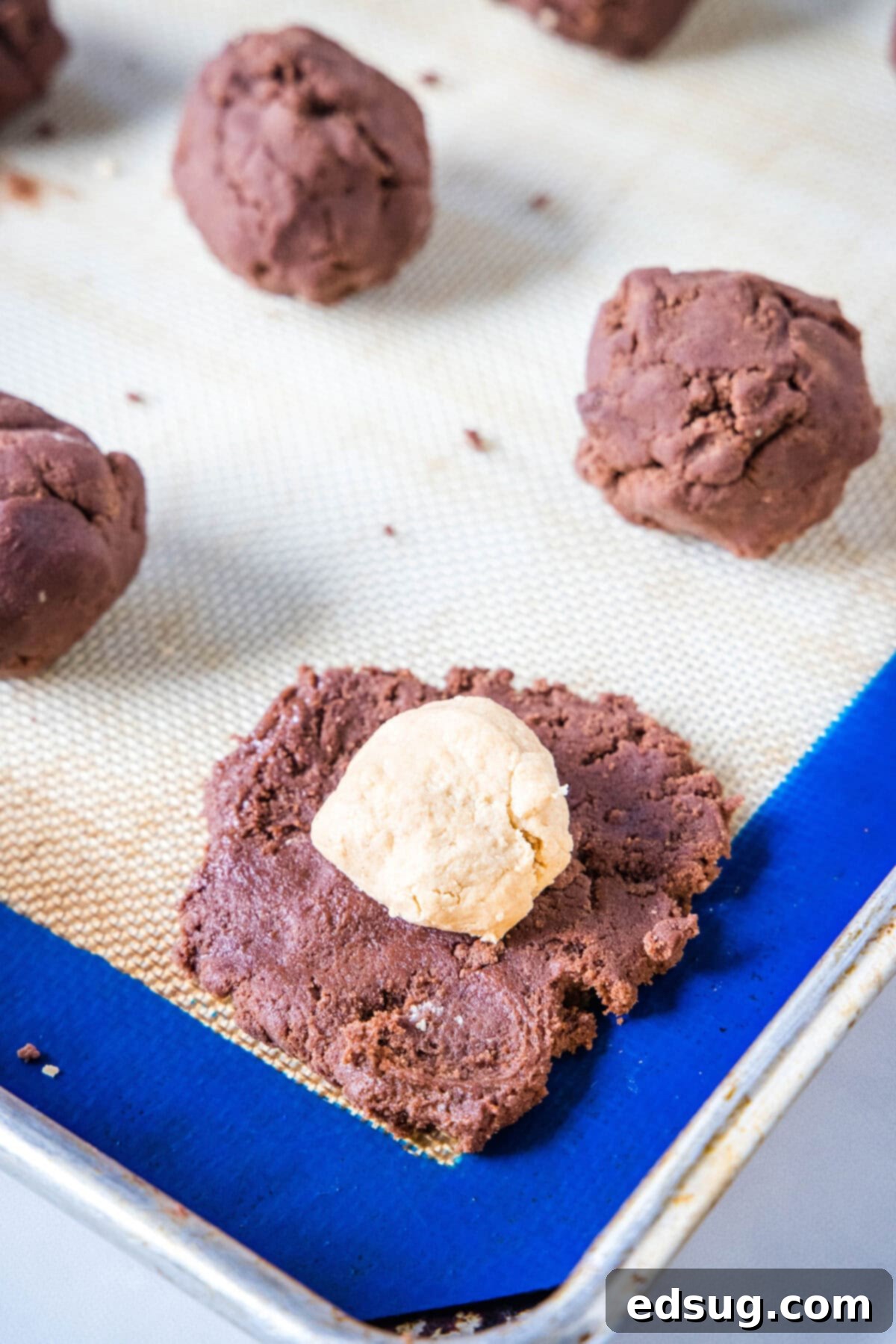 Decadent Chocolate Peanut Butter Truffle Cookies 4 stuffing peanut butter into chocolate cookie dough before baking