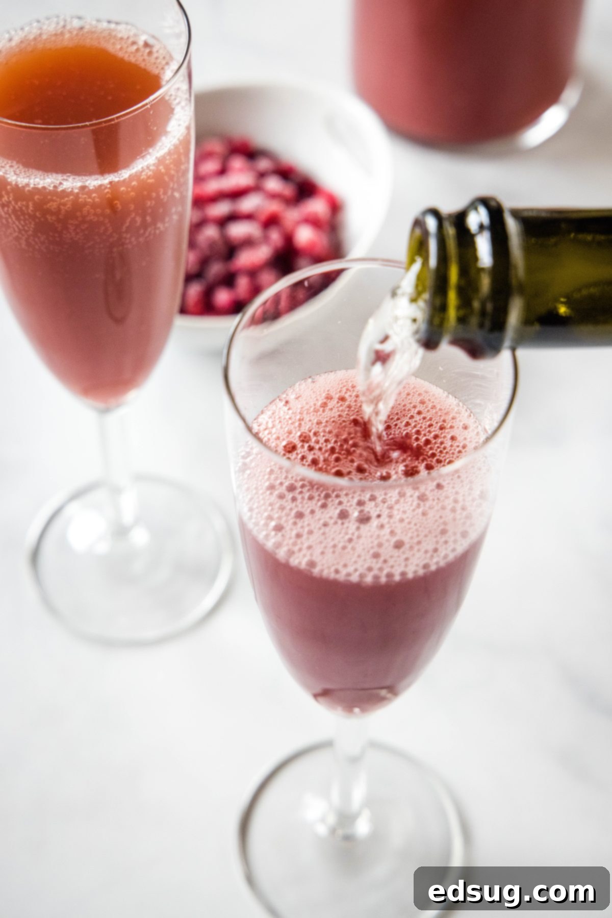 pouring champagne into a glass