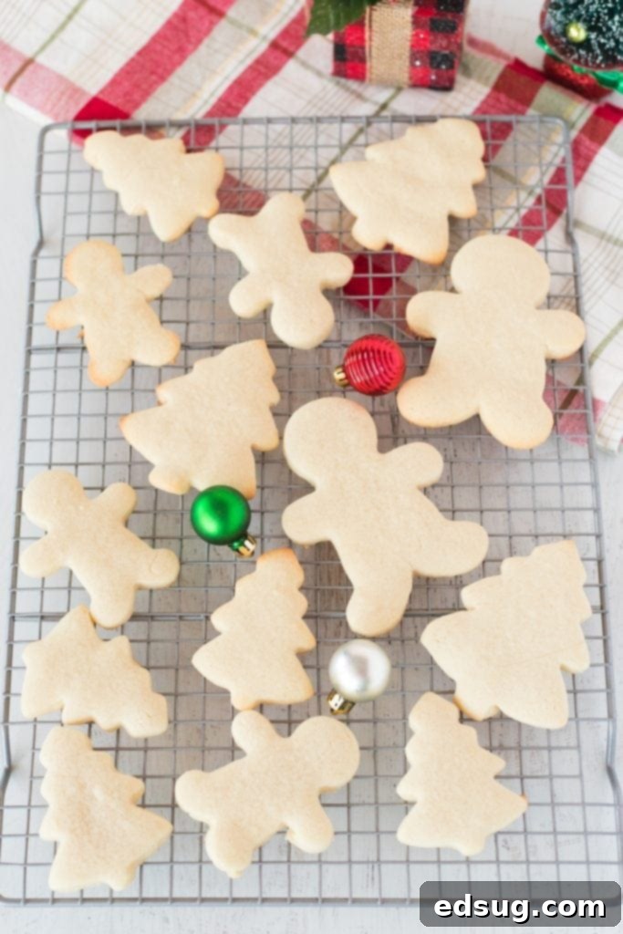 Sugar Cookie Delights 2 Soft sugar cookies cooling on a wire rack, ready for frosting.