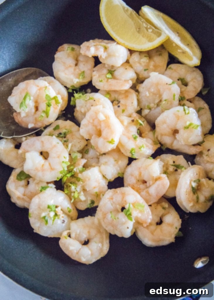 Zesty Garlic Butter Shrimp 5 looking down on a skillet with shrimp scampi