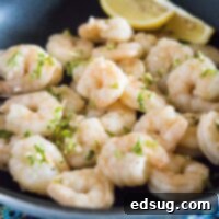 Zesty Garlic Butter Shrimp 7 cropped close up shrimp scampi in a pan