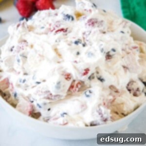 Cheesecake fruit salad in a bowl.