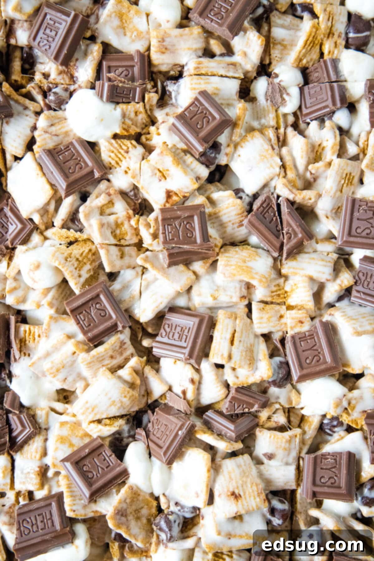 Campfire S'mores Krispie Treats 5 sliced s'mores krispie treats in baking dish