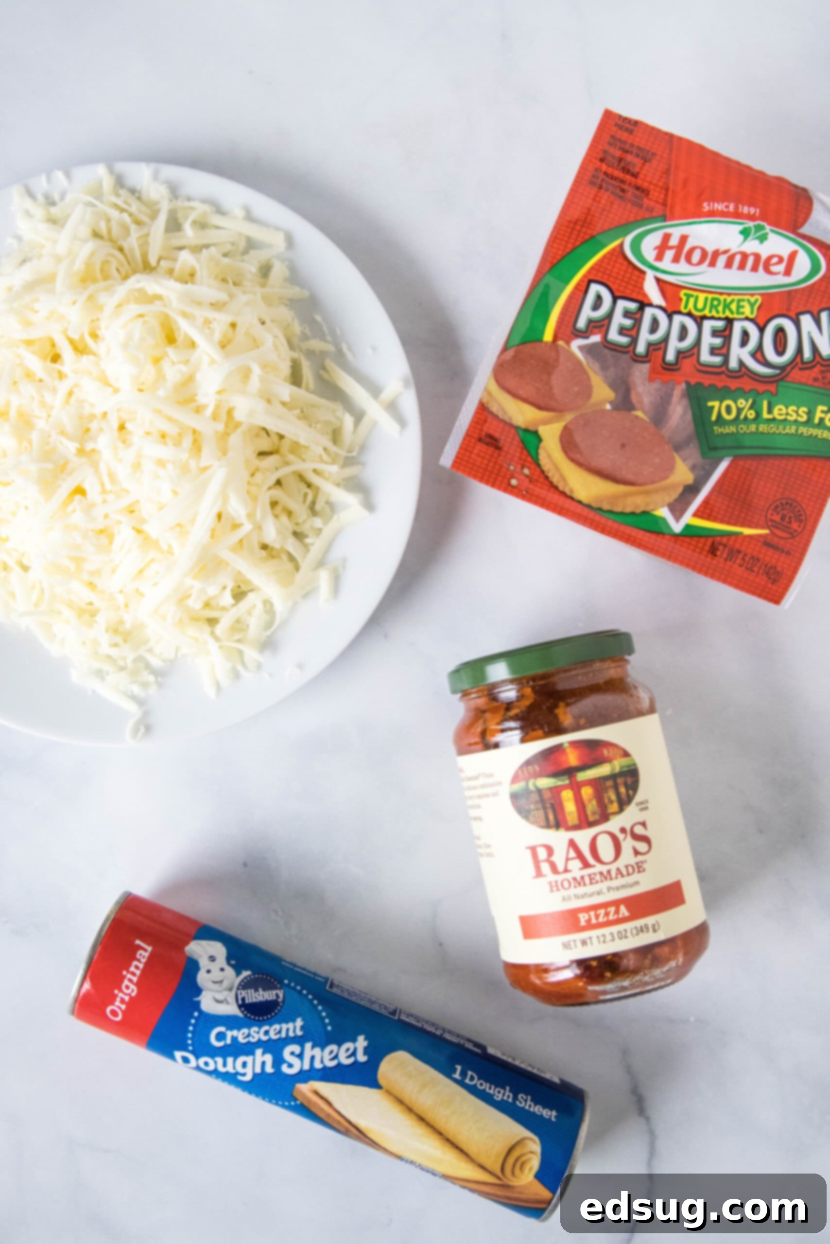 Cheesy crescent roll pizza is the perfect dinner or party snack! There’s zero kneading or rise time, just add your favorite toppings and bake! Ingredients for crescent roll pizza.