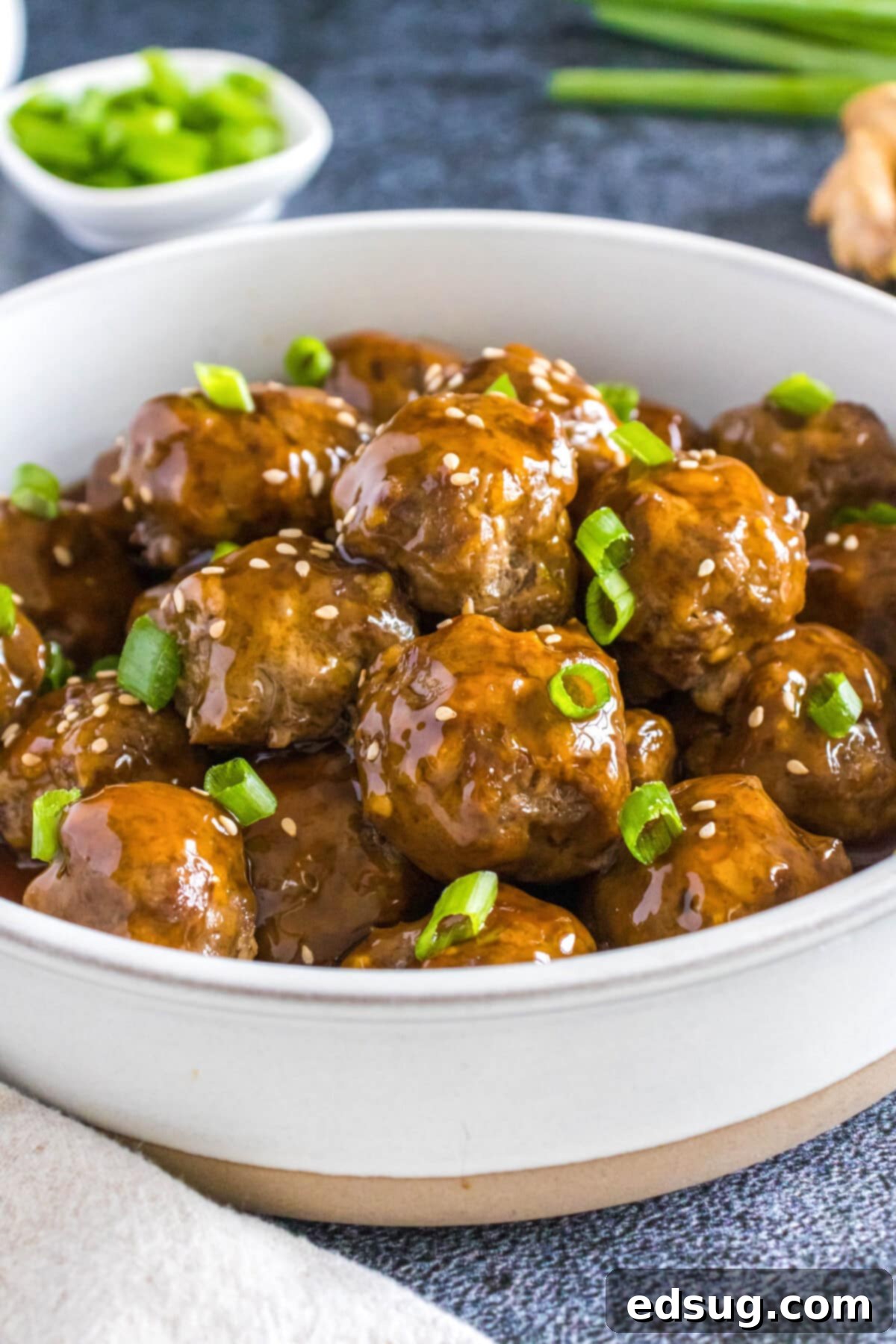 a white bowl with korean meatballs