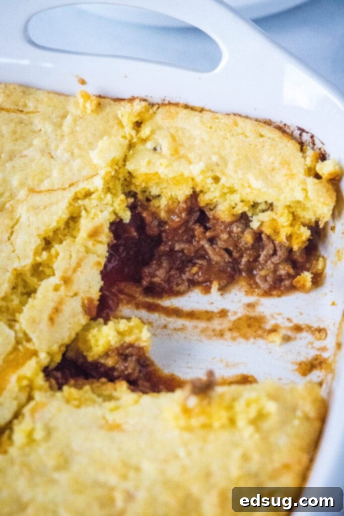 Hearty Sloppy Joe Cornbread Pie 5 Sloppy Joe Cornbread Casserole baked to golden perfection in a baking dish.