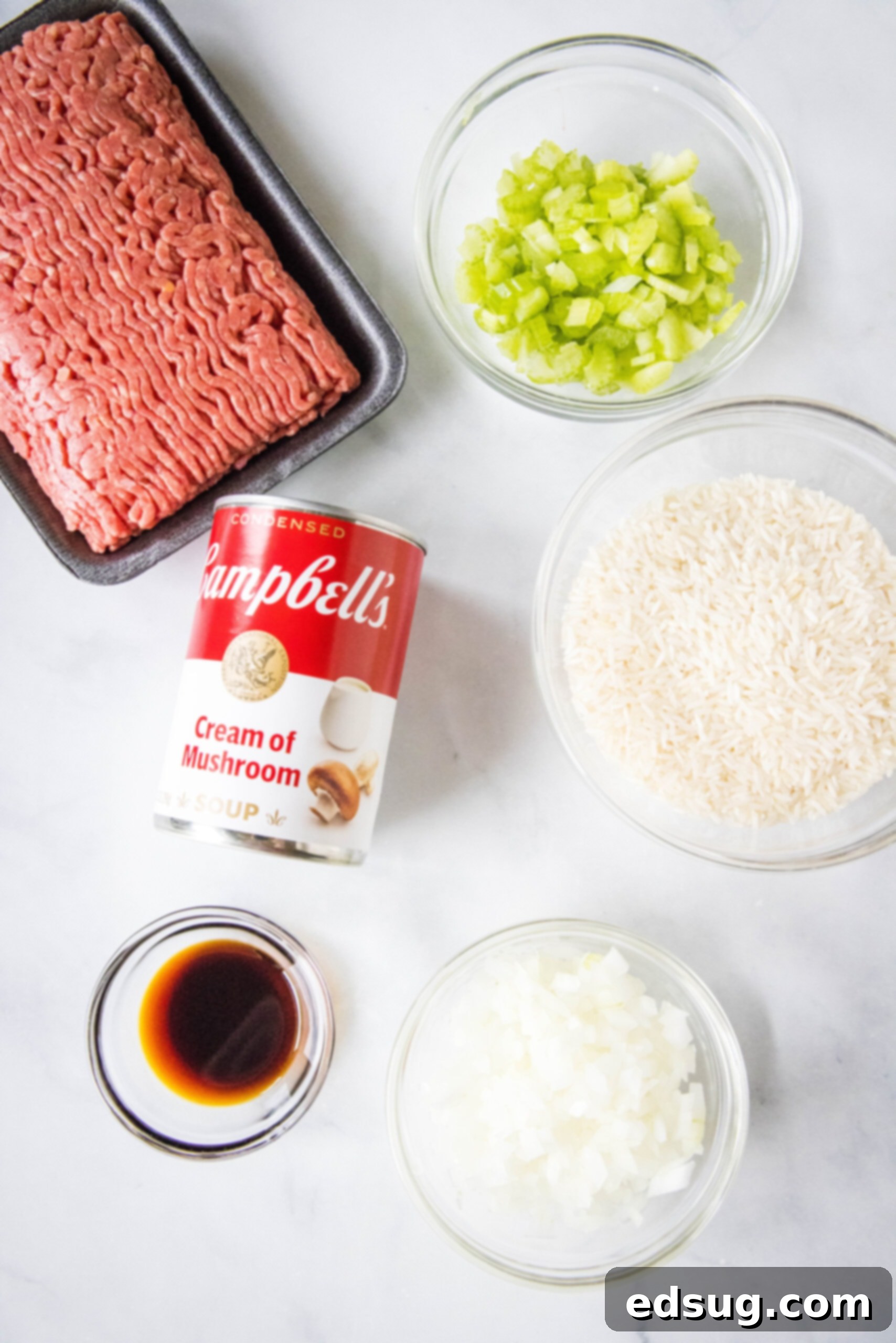 Hamburger rice casserole is an easy retro dinner recipe with fluffy rice, juicy ground beef, and veggies cooked in cream of mushroom soup! Ingredients for hamburger rice casserole.