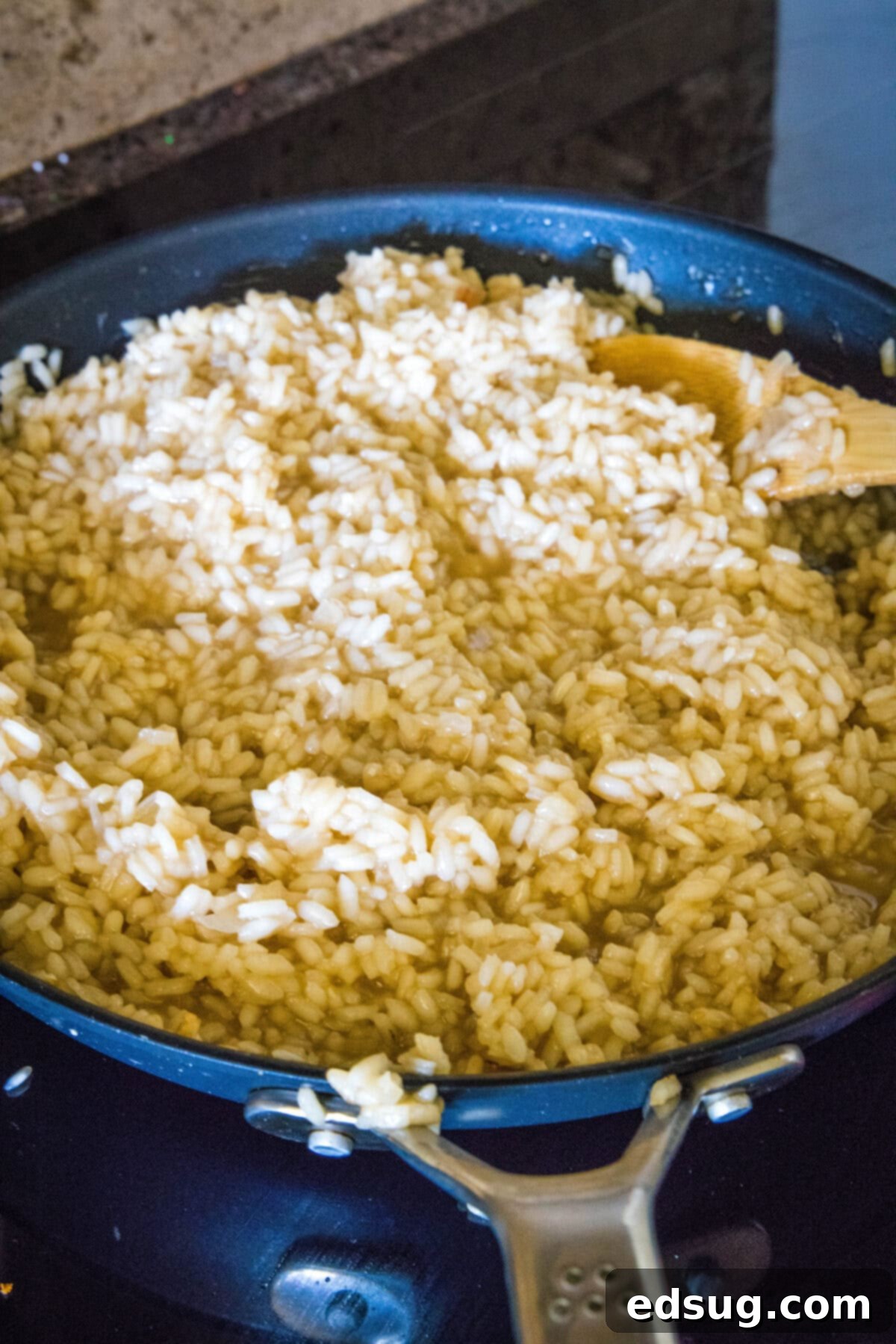 Cooked risotto in a skillet.