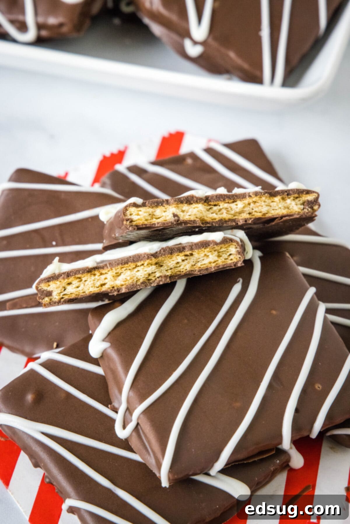 Decadent Chocolate Graham Delights 2 chocolate covered graham crackers with one cut in half