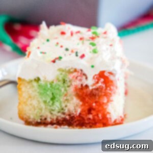 Holiday Hidden Gem 8 cropped close up christmas poke cake on white plate