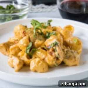 Proposal Worthy Chicken Pasta 3 Marry Me Chicken pasta served on a white plate.