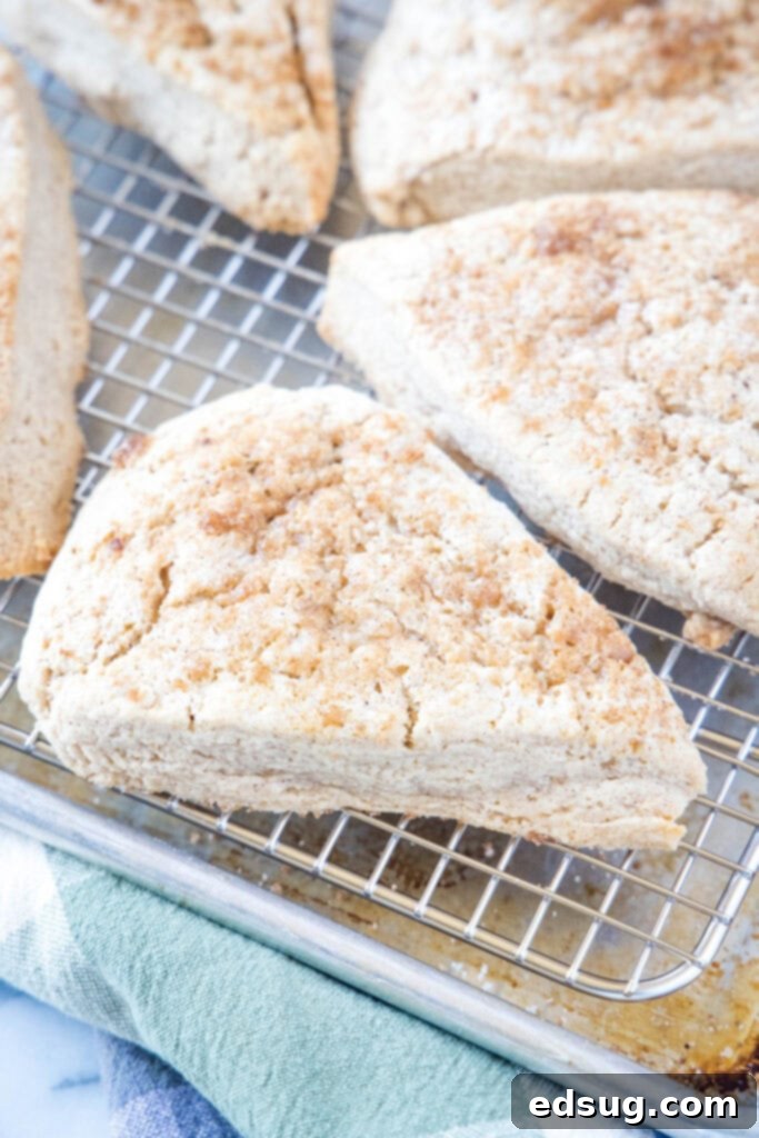 baked cinnamon scones on a cooling rack