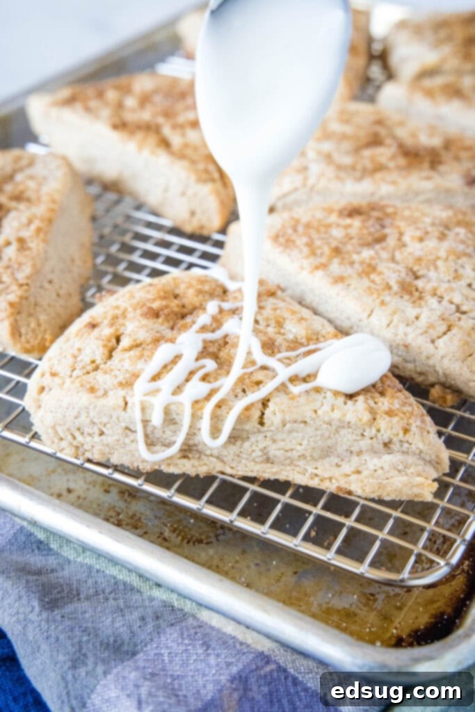 drizzling icing over scones